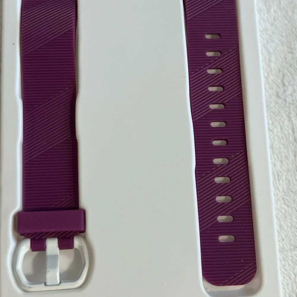 NIB Purple Fitness tracker watch for Android & iOS